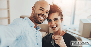 two hand plugging in electrical cord representing power and potential of commercial real estate